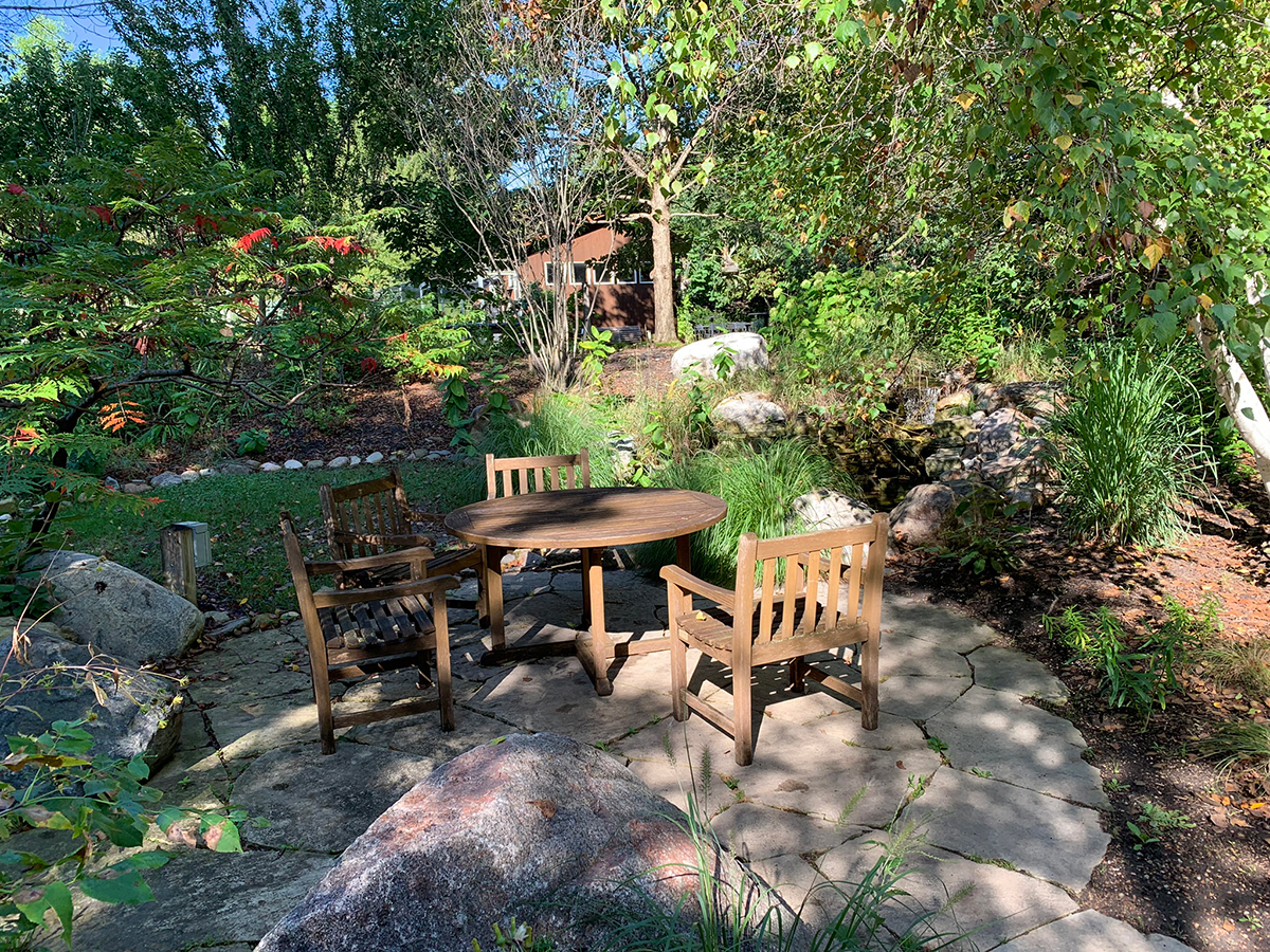  Naturalist Garden with wood table and chairs