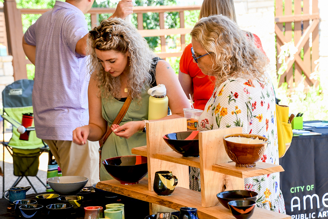 Women shopping for pottery