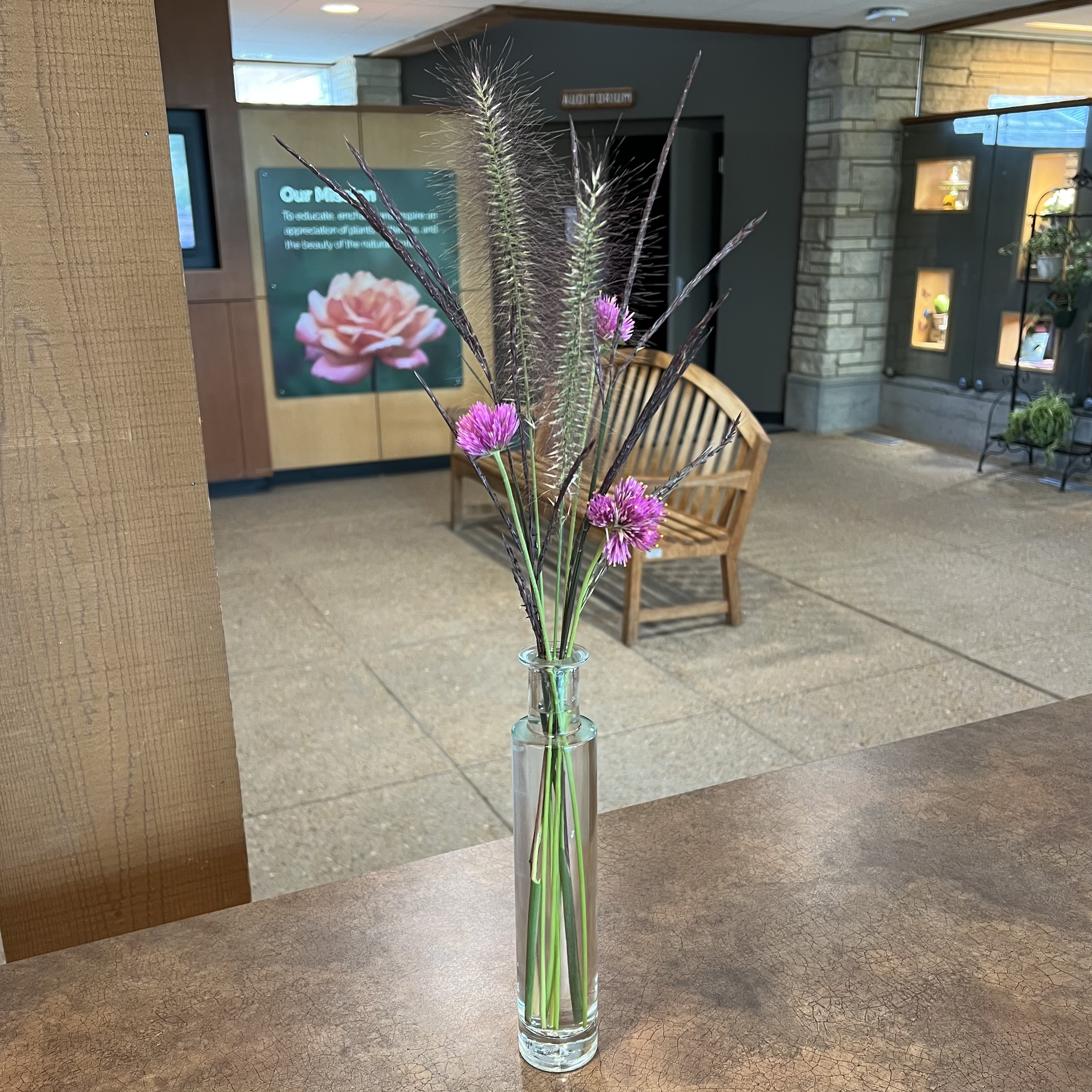 a bouquet of ornamental grasses and pink blooms