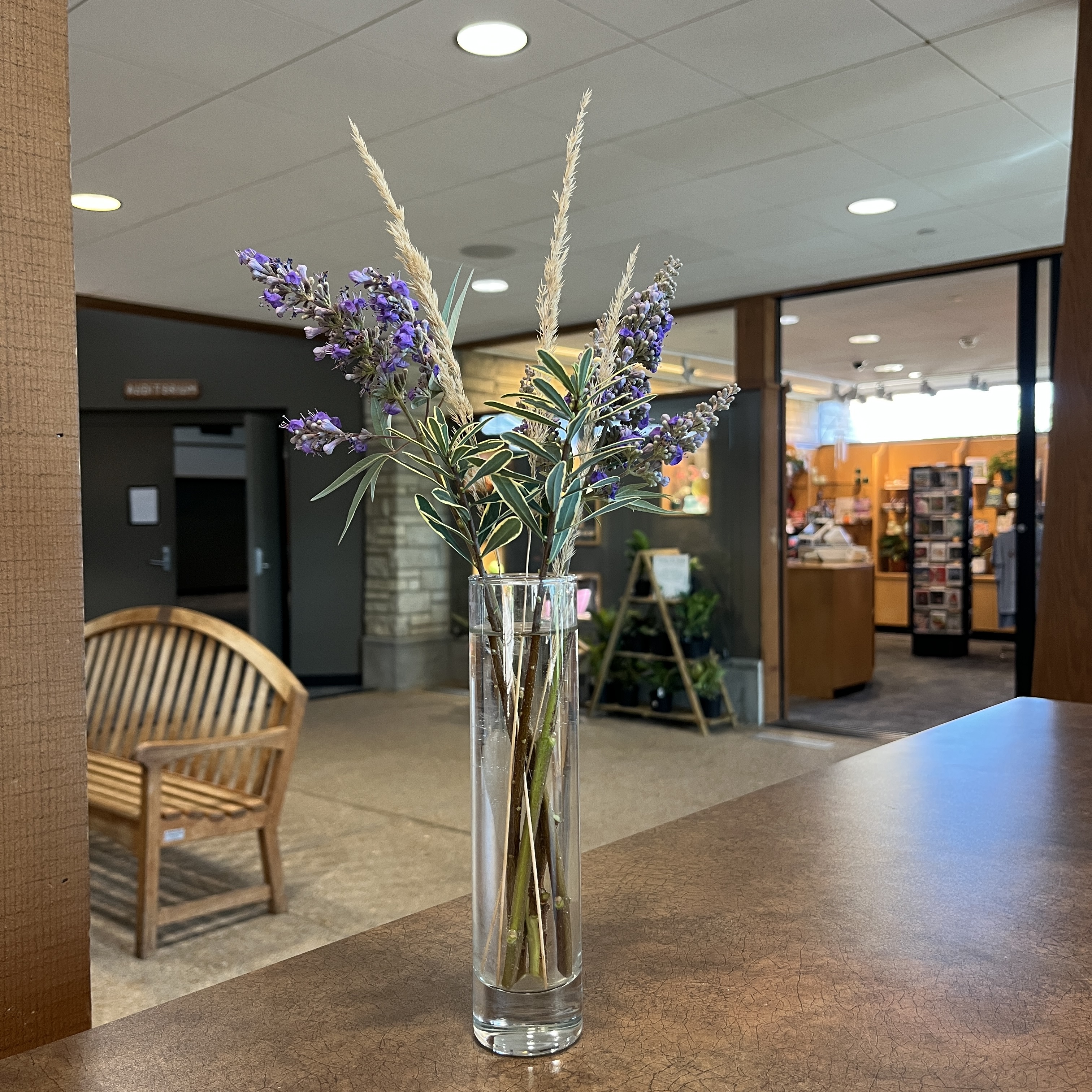 Bouquet with purple flowers and grasses.
