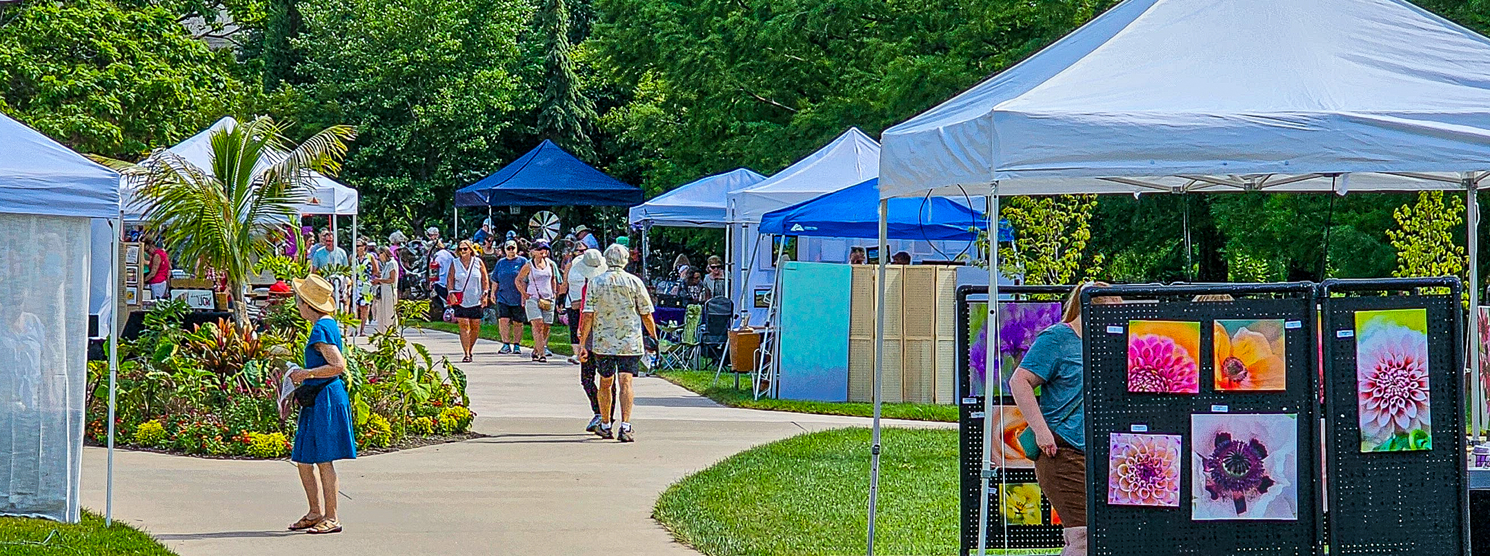 People shopping at an outdoor art fair