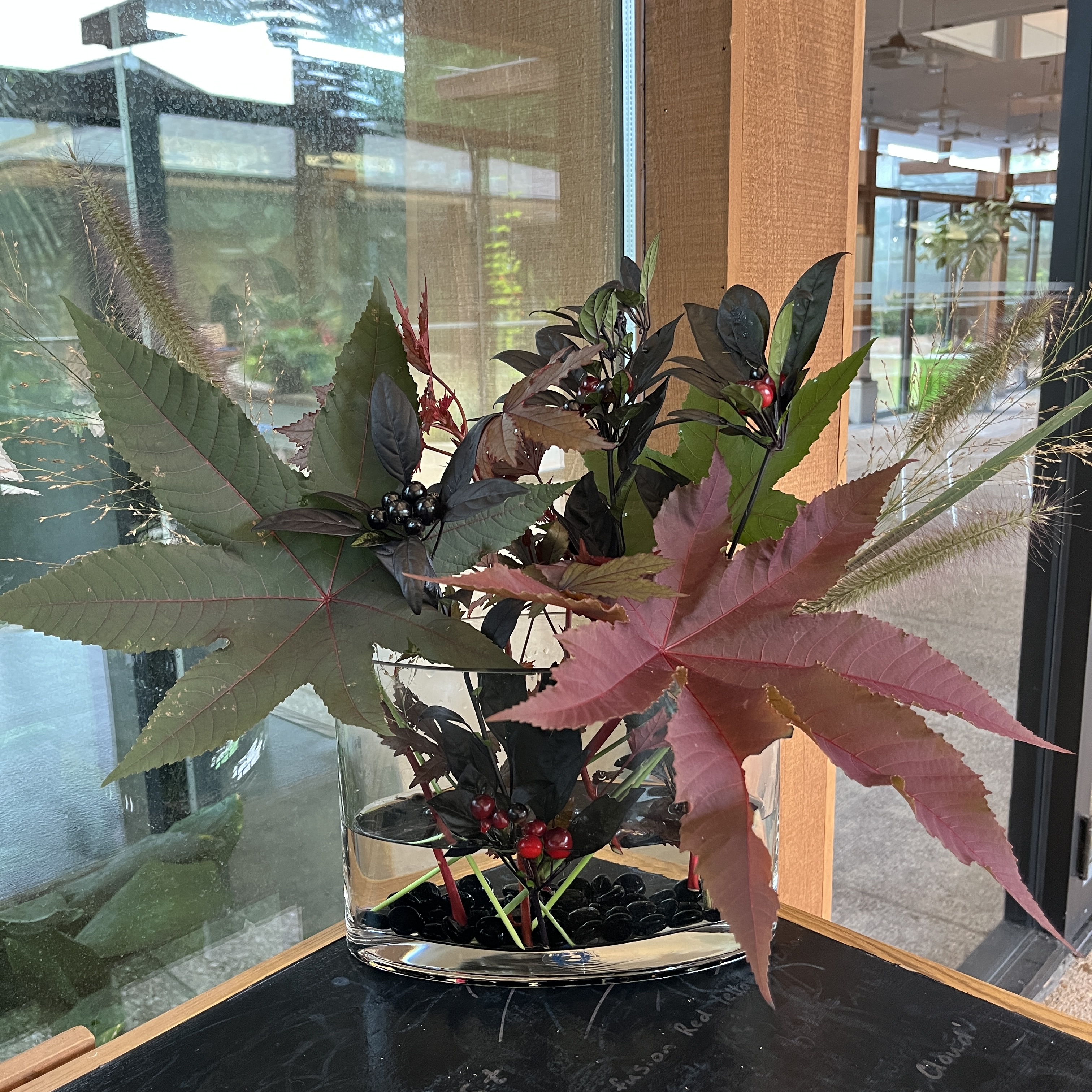 Bouquet with large leaves and grasses.