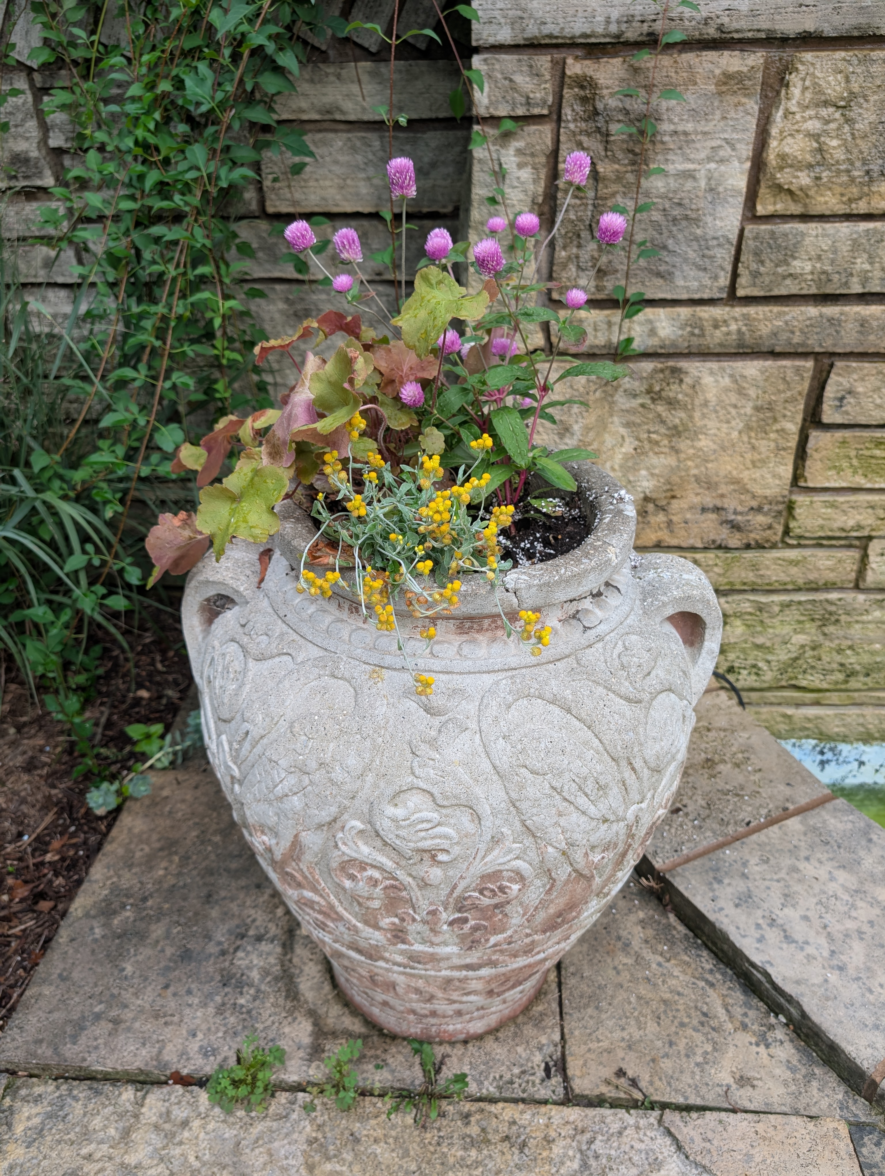Small urn planter with fall plants