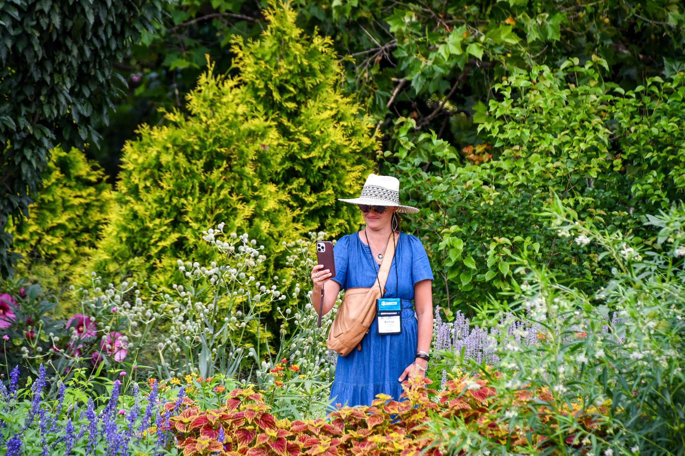 Garden Guest Taking Picture of Plants at PPA