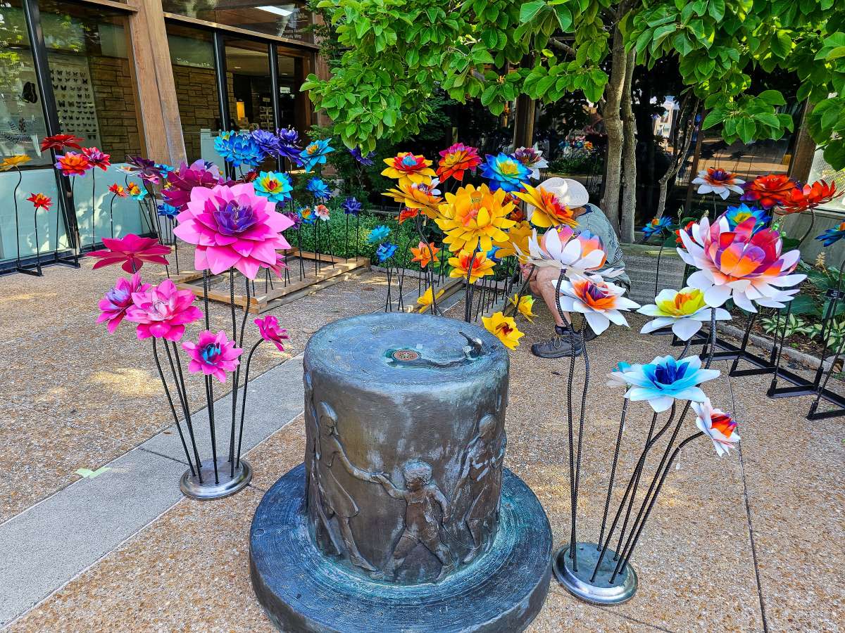 Colorful metal flower sculptures