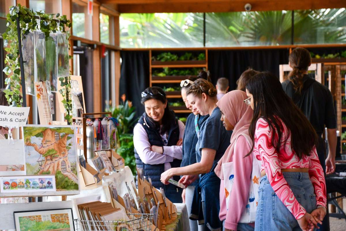Shoppers browsing at an art fair