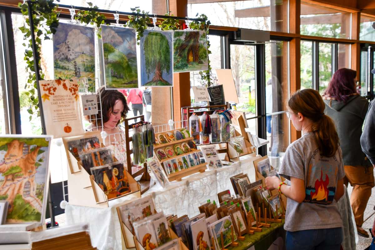 Shoppers browsing at an art fair