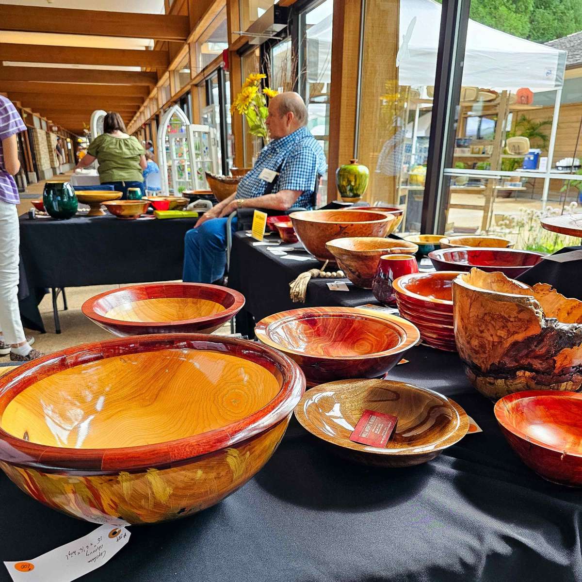 Handmade wooden bowls displayed on a table