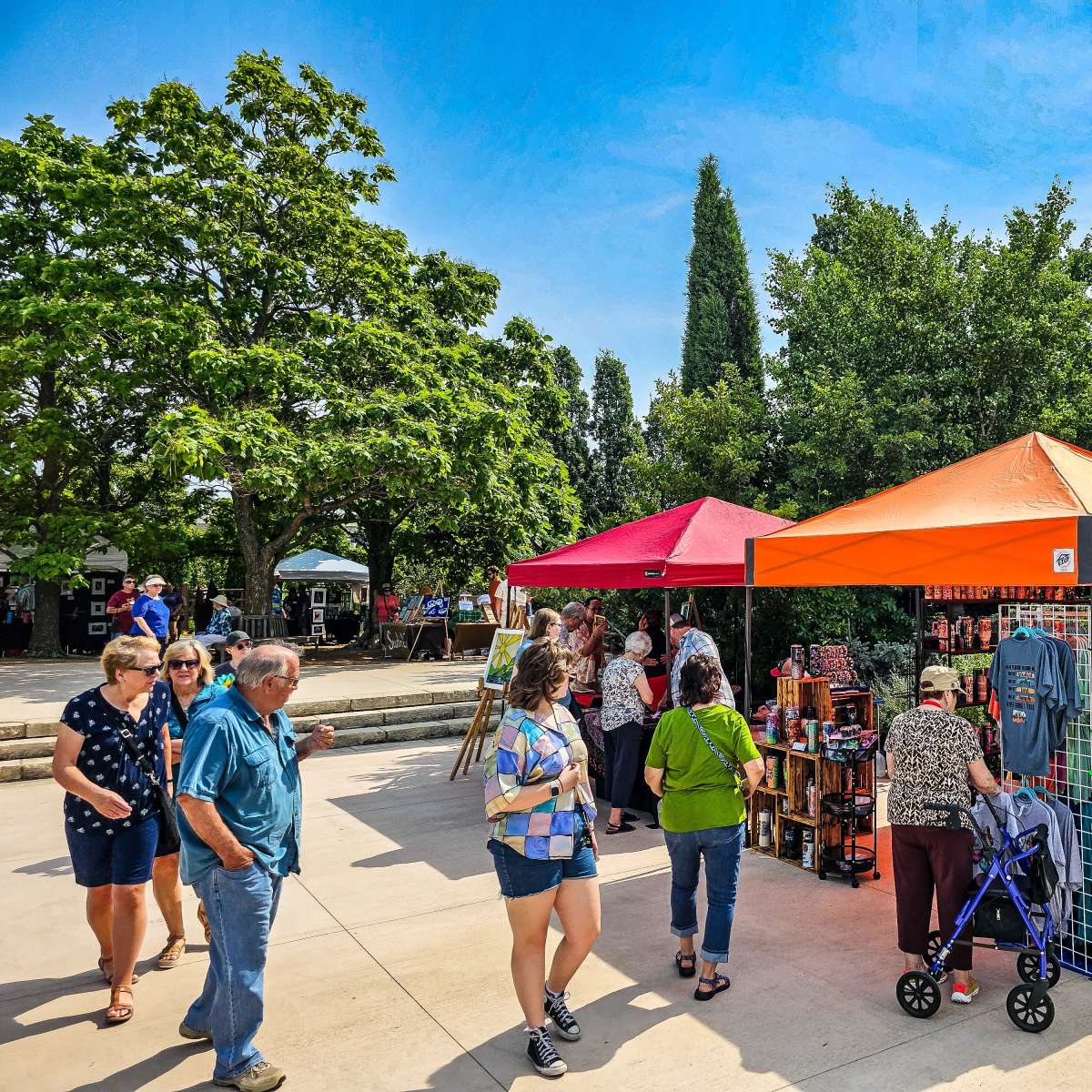People shopping at an outdoor art fair