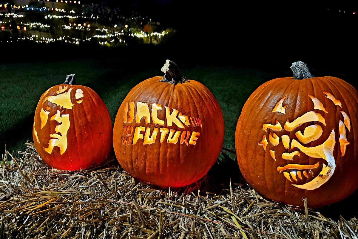 jack-o-lanterns on hay bales