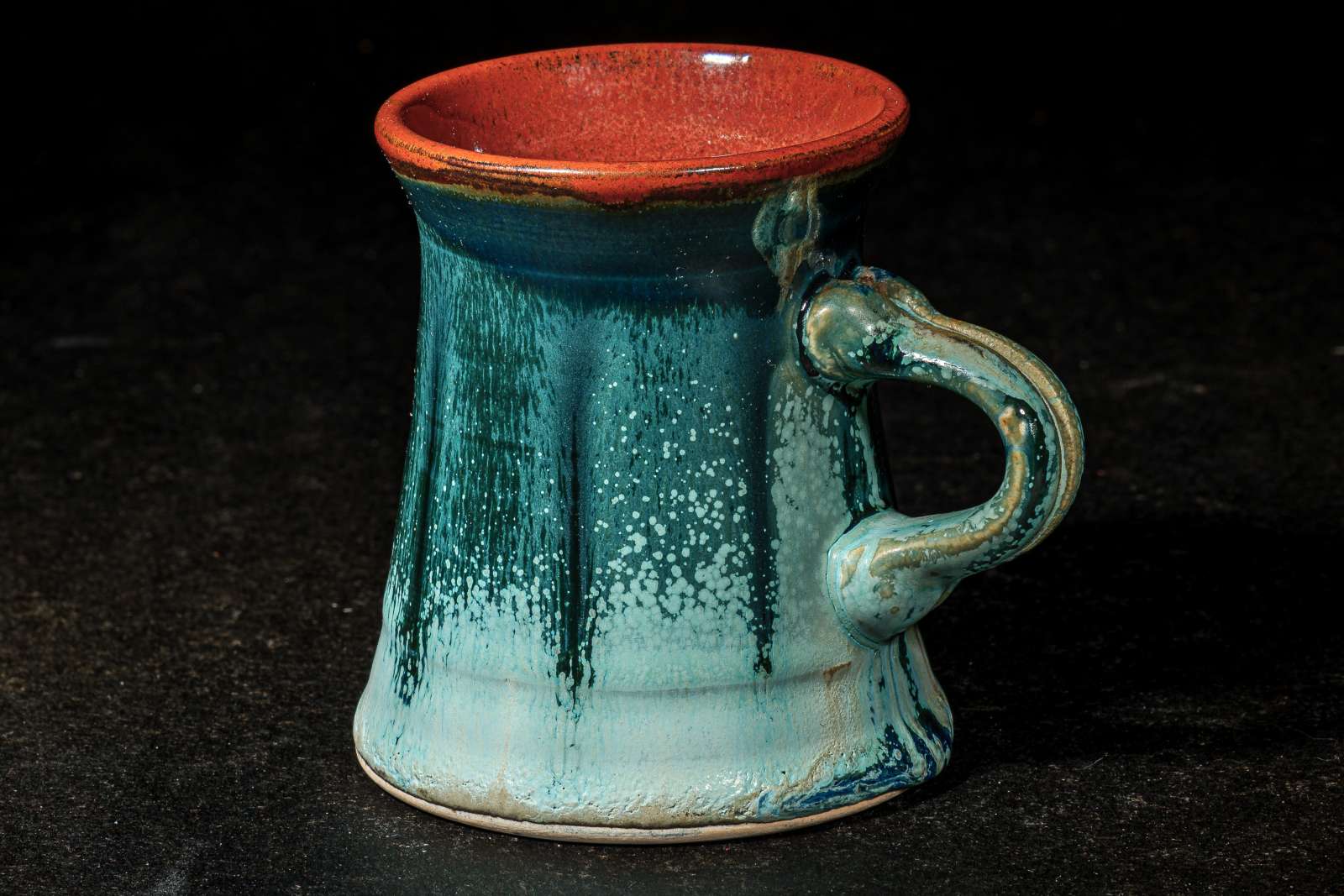 handmade ceramic mug with teal glaze